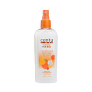  Bottle of Cantu Care for Kids Conditioning Detangler - 177 ml, surrounded by shea butter, coconut oil, and honey.