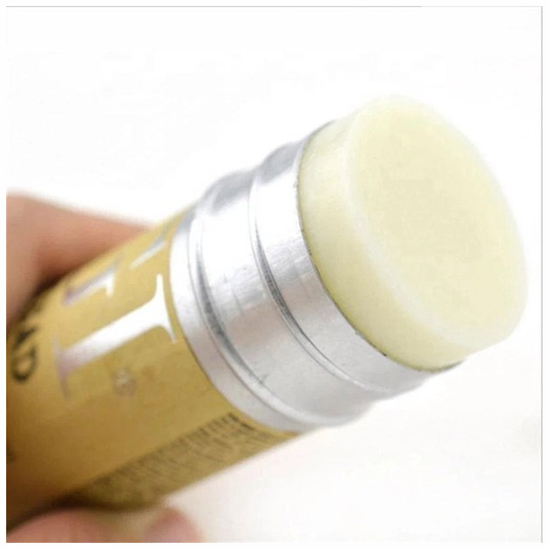  Image of IKT Hair Wax Stick 75gm - For Soft & Sorted Hair - A wax stick surrounded by a natural background, symbolizing nourishment, and styling ease for hair.
