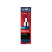 A bottle of L'Oreal Paris Revitalift 0.3% Pure Retinol Night Serum, surrounded by L'Oréal branding.